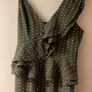 Green polka dot asymmetrical spaghetti Strap dress. Size Medium. Never worn